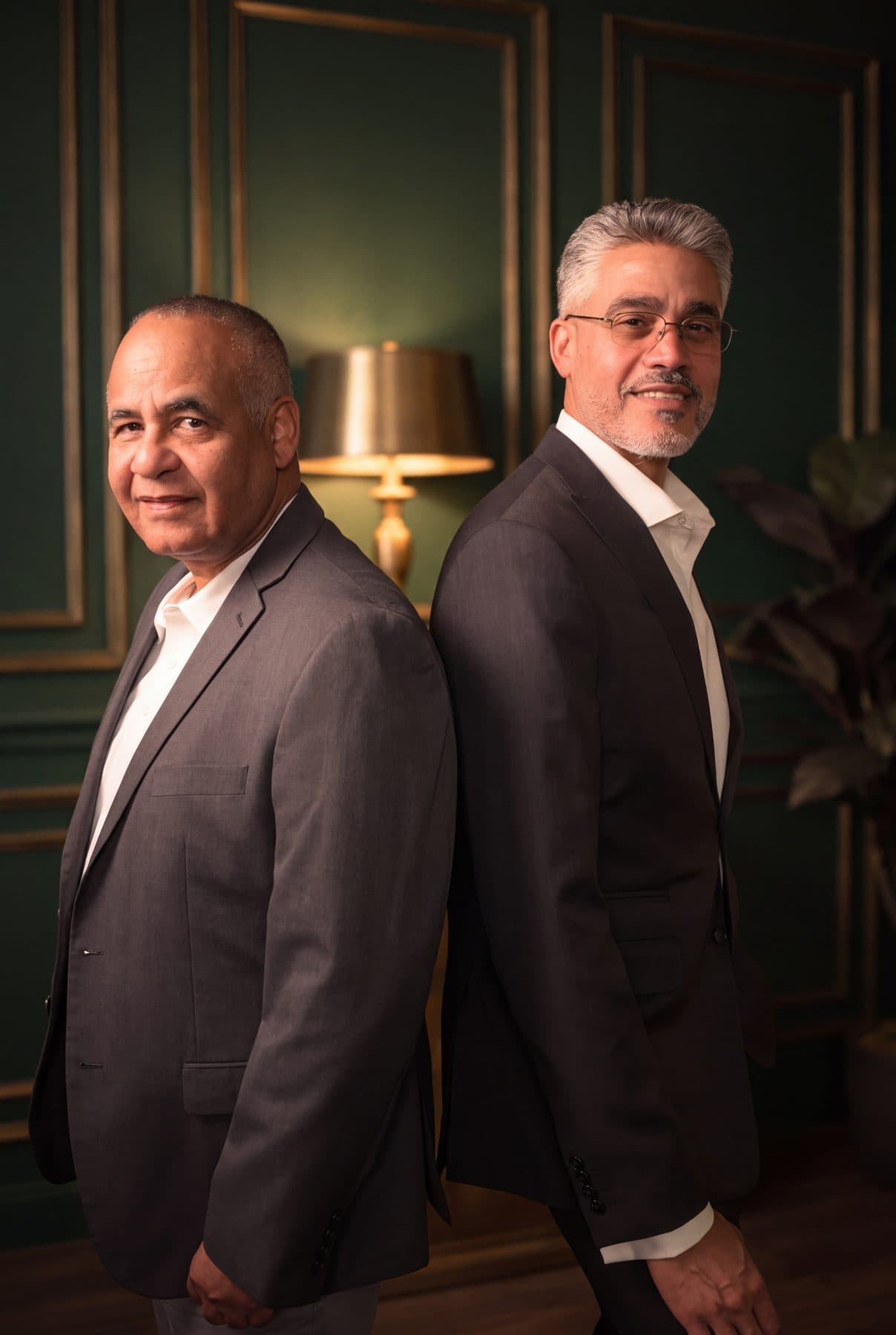 Ruben Rodriguez and Rafael Sánchez, the co-founders of RSCCA, standing back to back.
